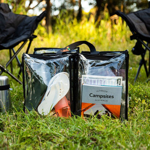 CamPaq large camping bag - black - 2 pocket view on grass - filled